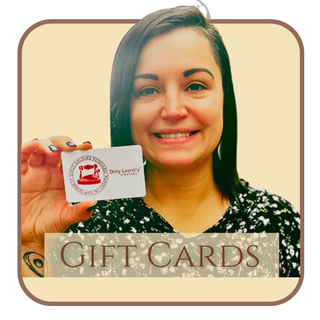 A woman is holding a gift card in her hand