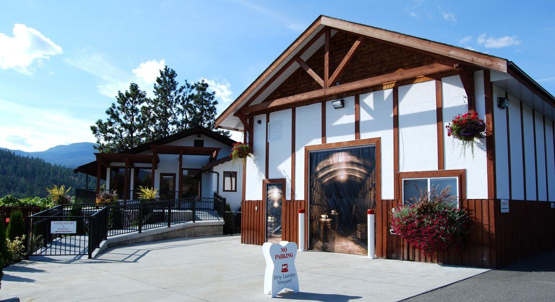 A white and brown building with a sign that says ' a ' on it