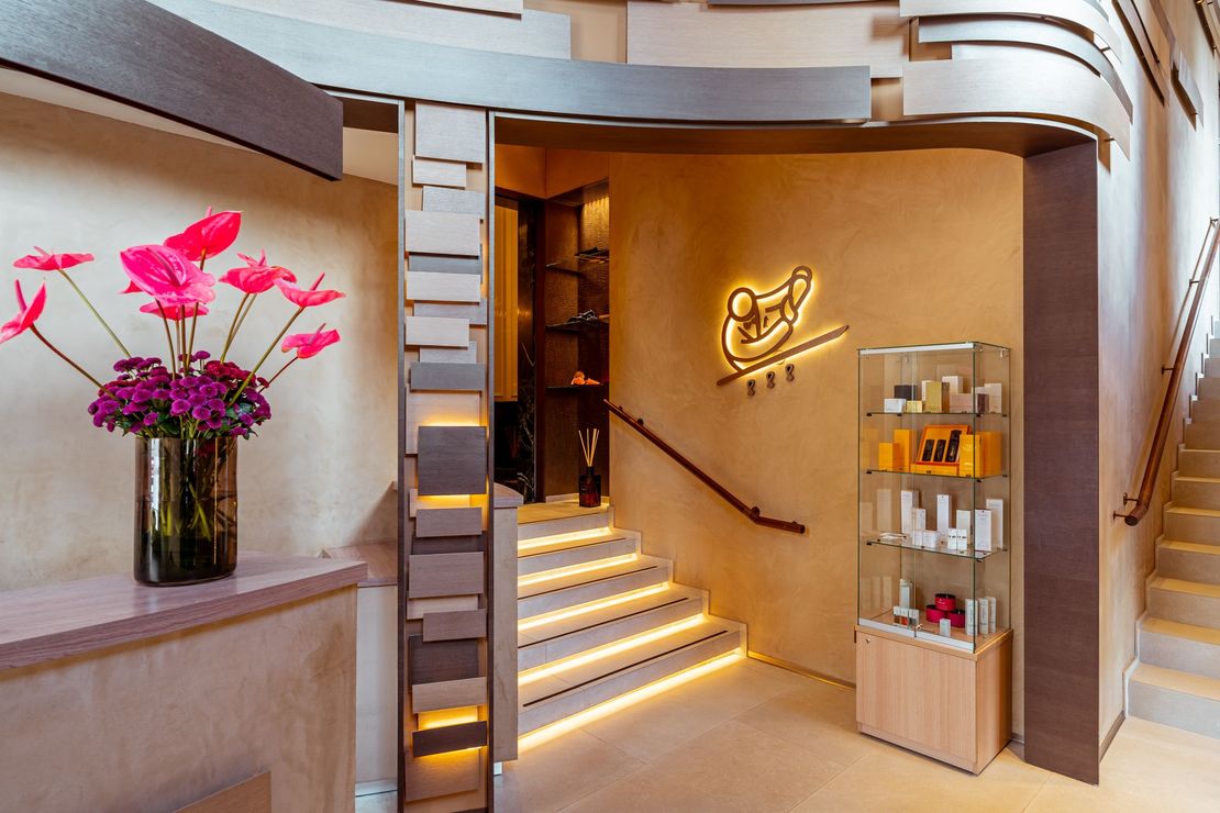 Casa Cipriani Milano Spa on Corso Venezia features a luxurious welcome desk and a staircase to private treatment cabins.