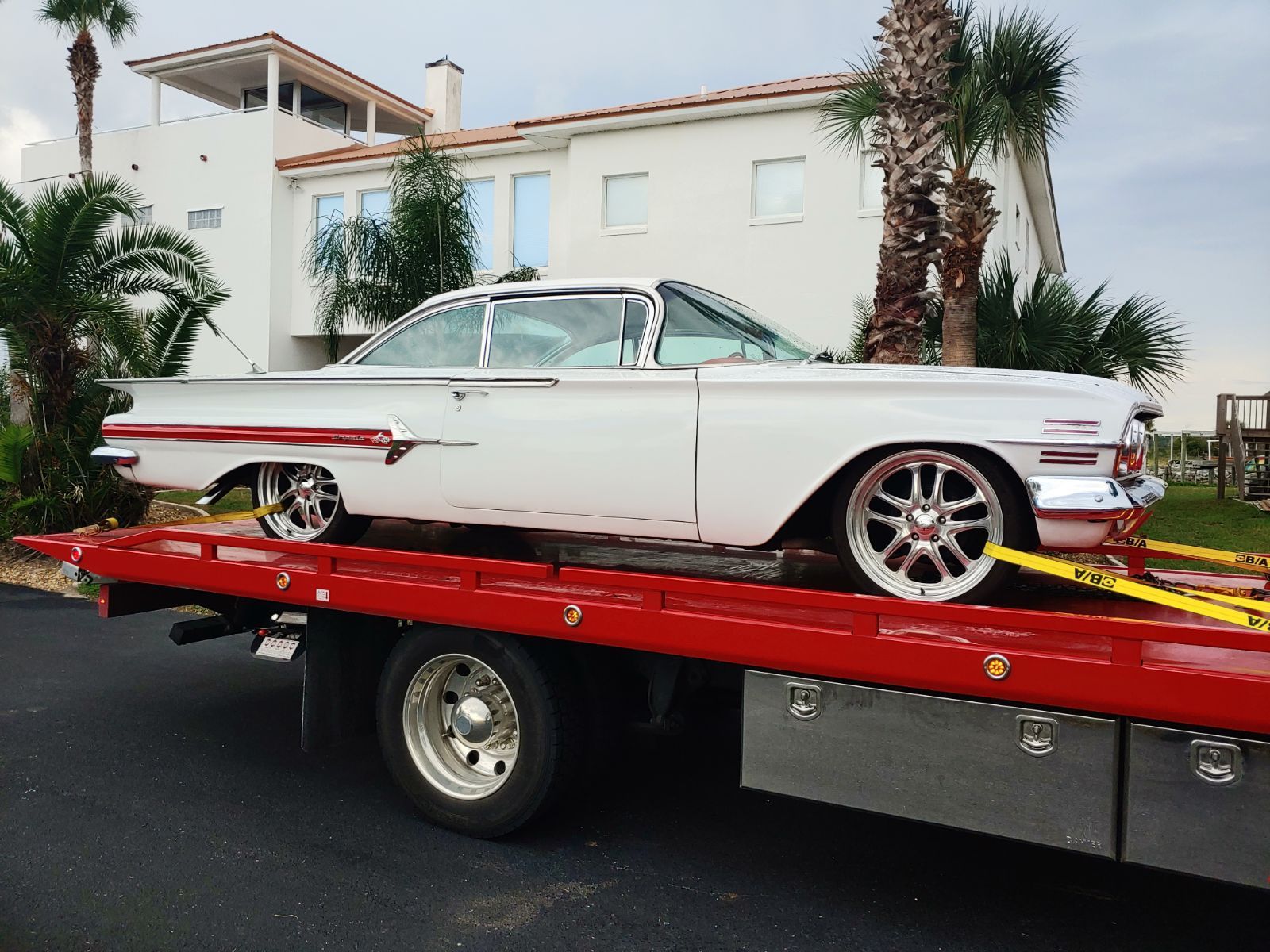 Tow Truck with White Car — Palatka, FL — Johnson's Towing