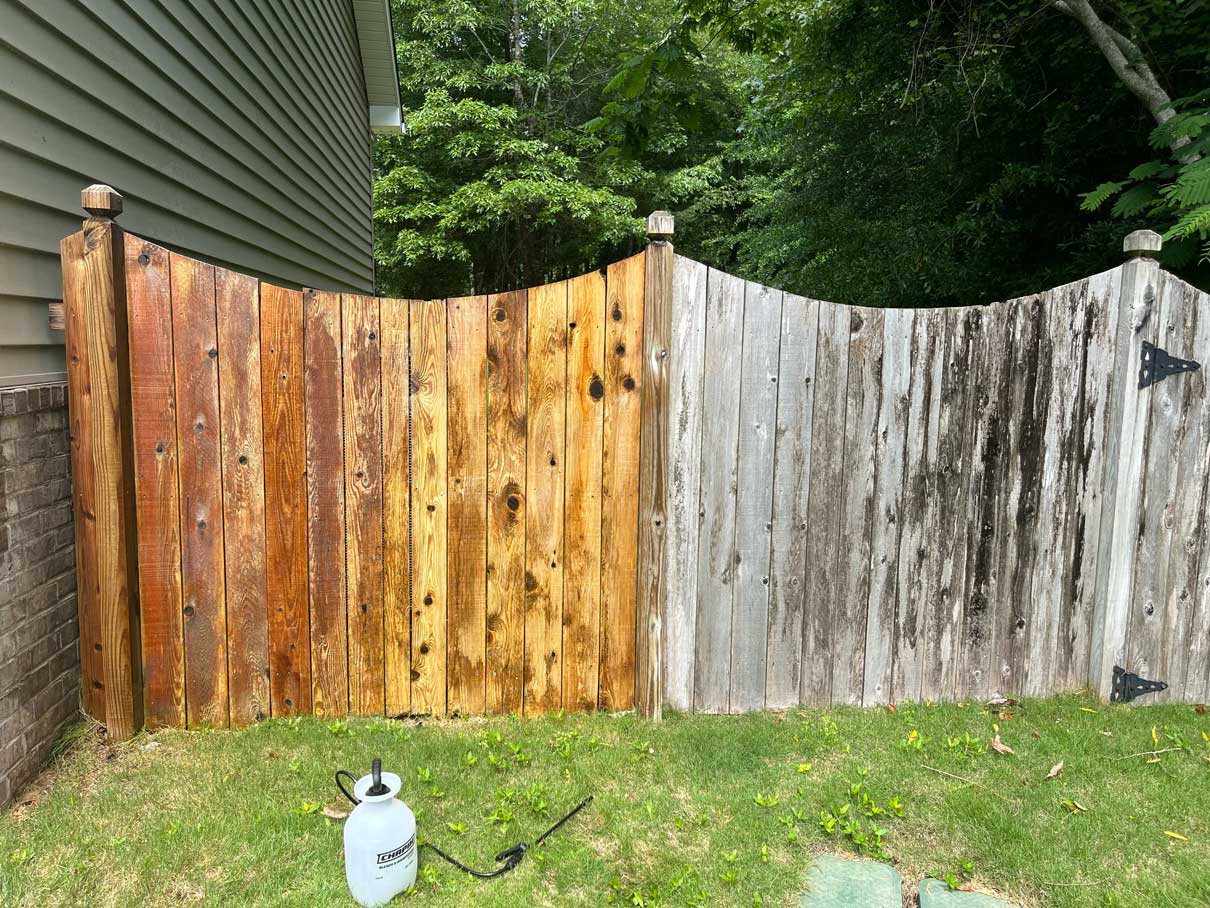 Clean fence after pressure washing — Northport, AL — Moody’s Pro Wash