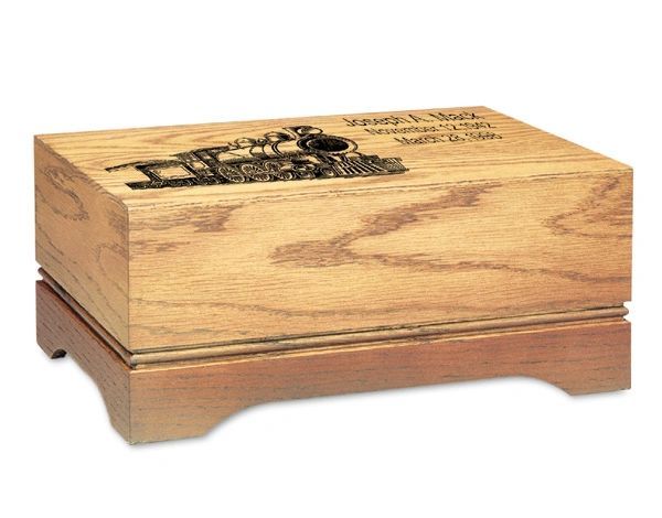 A wooden box with a picture of a train on it