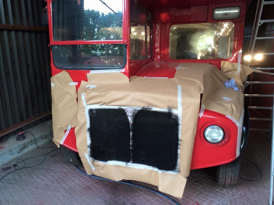 Routemaster mobile bus bar being painted 