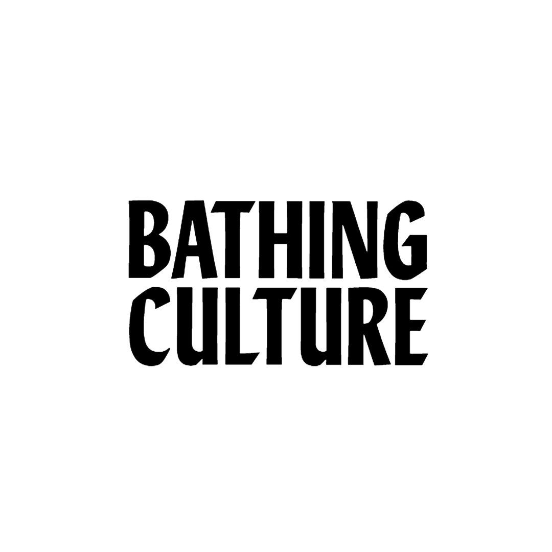 a black and white logo for bathing culture on a white background .