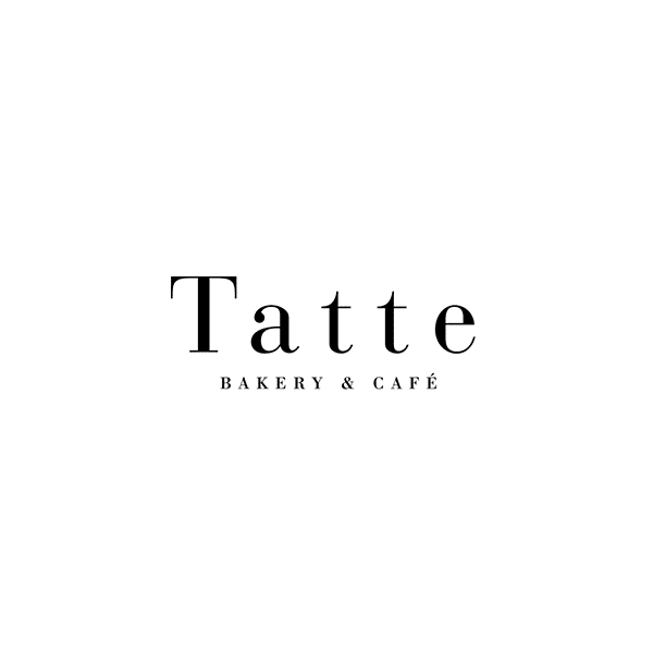 the logo for tatte bakery and cafe is black and white .