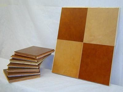 leather tiles glued on wood