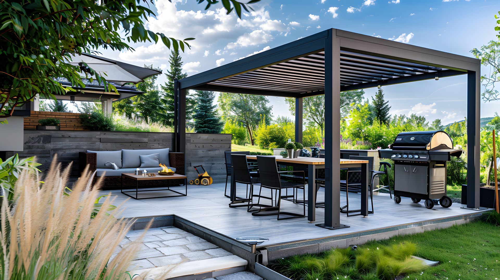 Outdoor patio with steps, built-in grill, seating area, and landscaping.