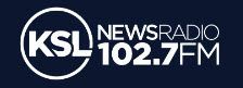 KSL Newsradio 102.7 FM logo with a white circle around the letters KSL on a dark blue background.