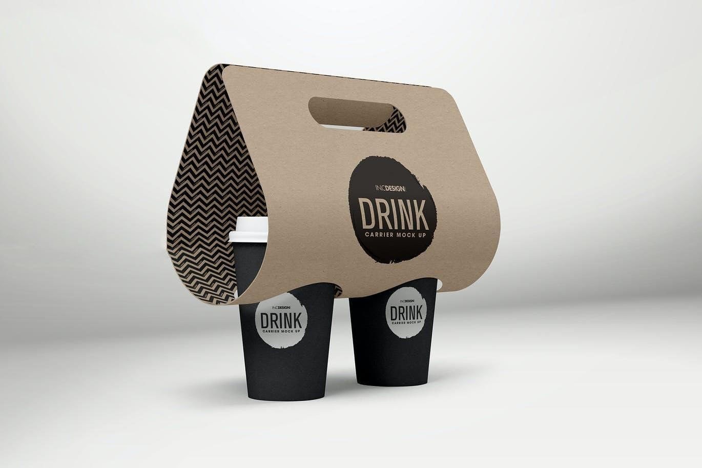 A cardboard drink holder holds two cups of coffee