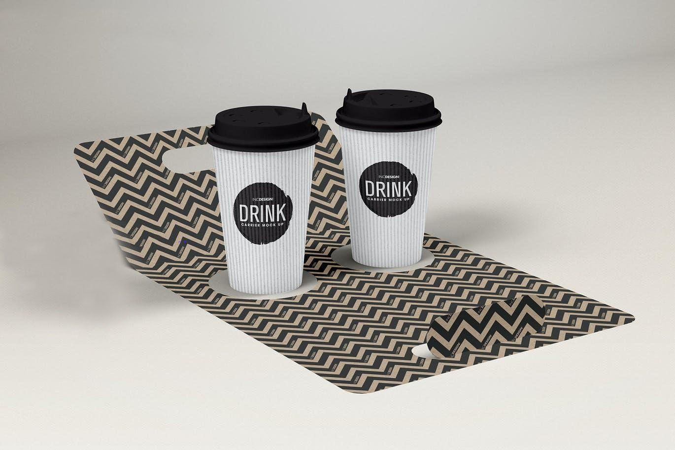 Two coffee cups are sitting on top of a chevron patterned mat.