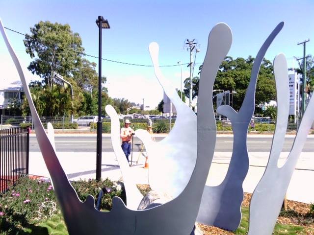 man surveying in city