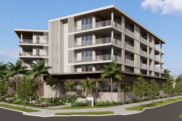 Modern six-story apartment building with balconies, palm trees, and landscaped corner entrance under blue sky