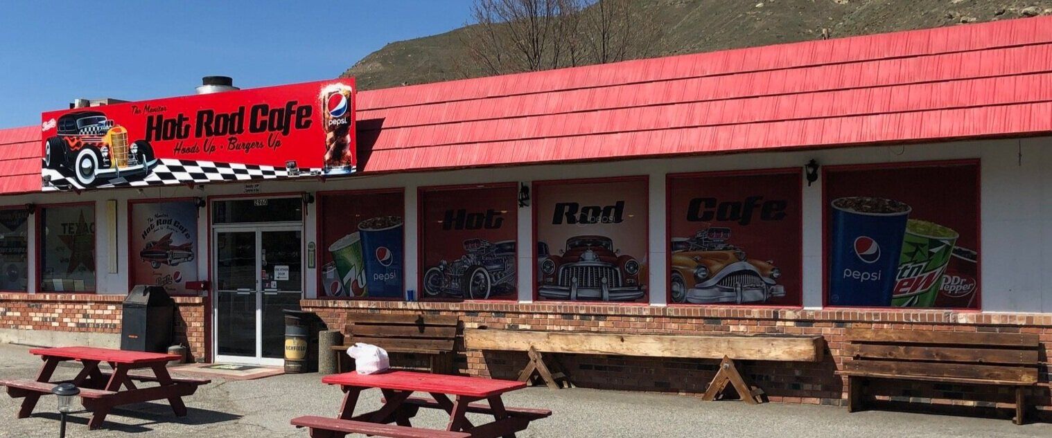 The Hot Rod Cafe sign as it looks on the restaurant in the real world. There is also several windows decorated to match.