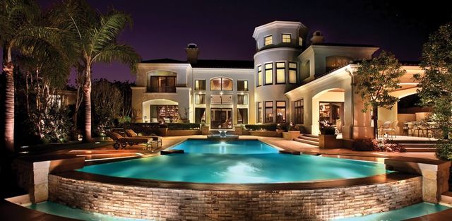 big mansions with pools on the beach