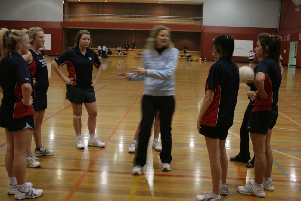 Gillian Lee actively coaching at a Melbourne school’s sports academy