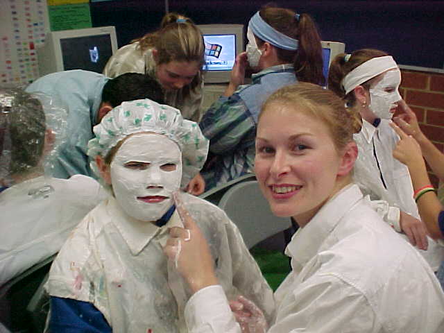 Danni’s first year of teaching, helping the students create face masks of endangered animals
