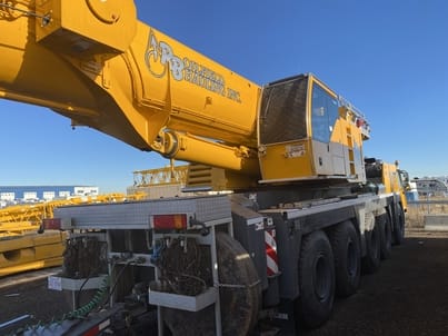 A picture of a yellow mobile crane rental in Grande Prairie.