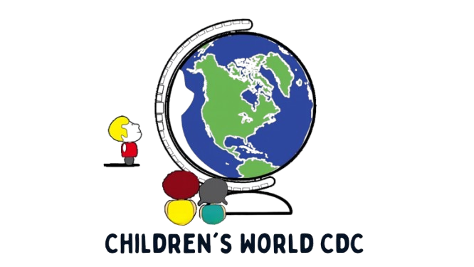 A group of children are standing on top of a globe holding hands.