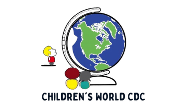 A group of children are standing on top of a globe holding hands.
