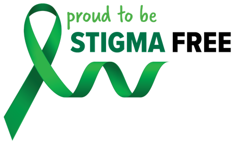 A green ribbon with the words `` proud to be stigma free '' written on it.