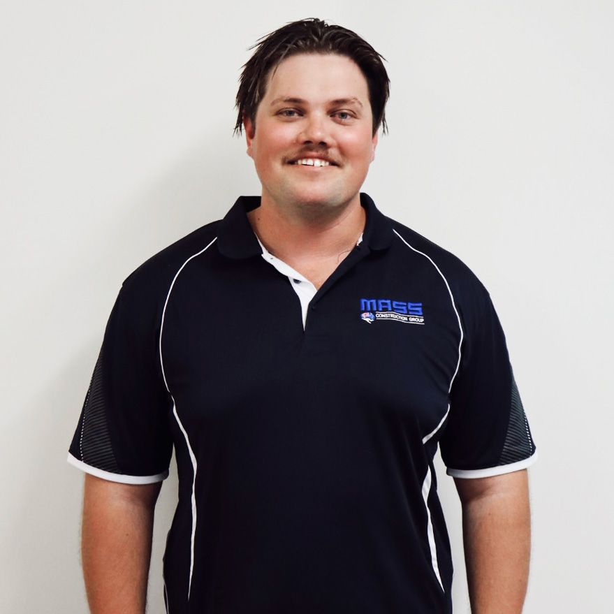 An Excavator Is Loading Dirt — Mass Construction Group Australia Pty Ltd in South Mackay, QLD