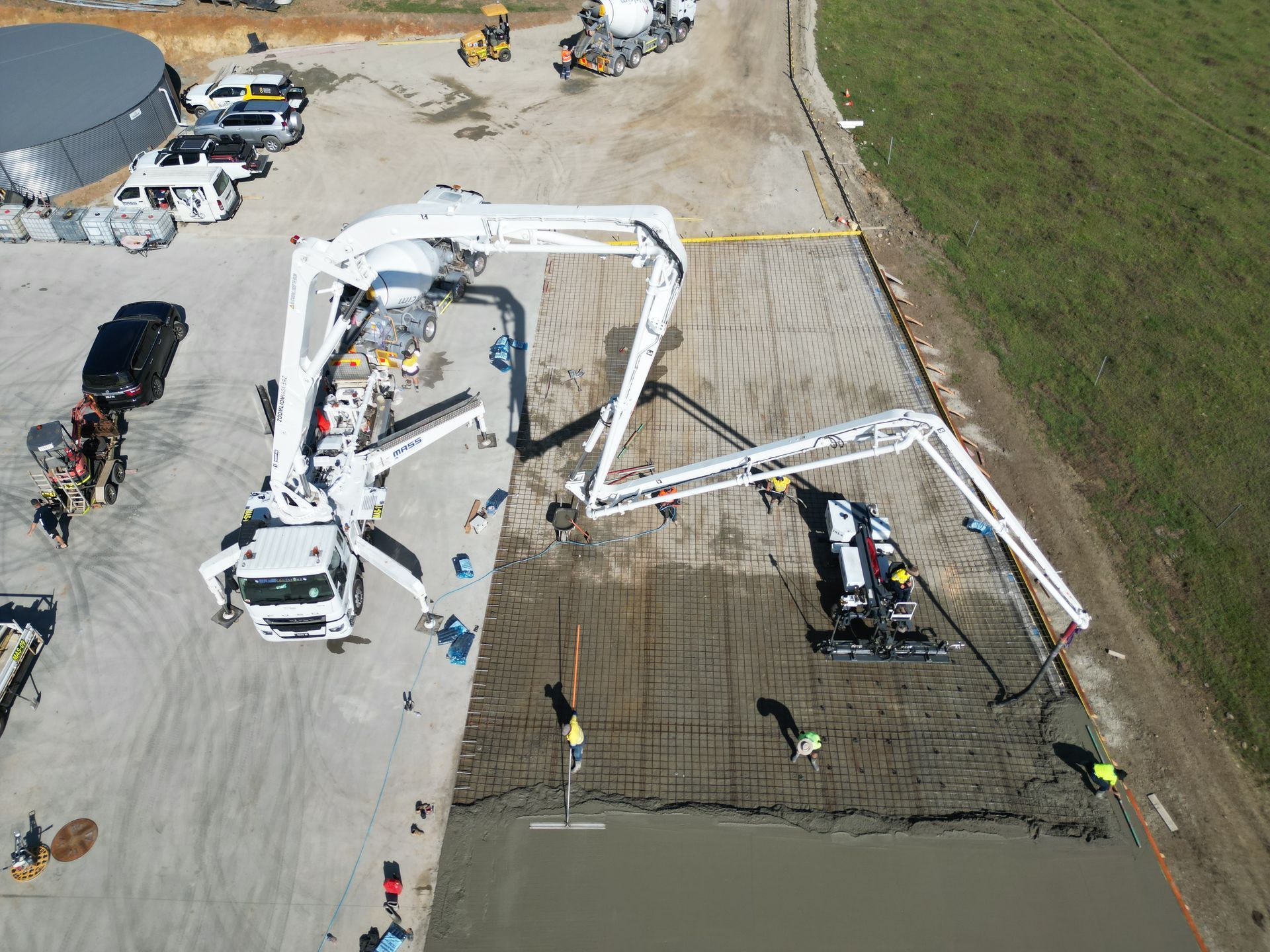 White Truck Pumping Concrete — Mass Construction Group Australia Pty Ltd in South Mackay, QLD