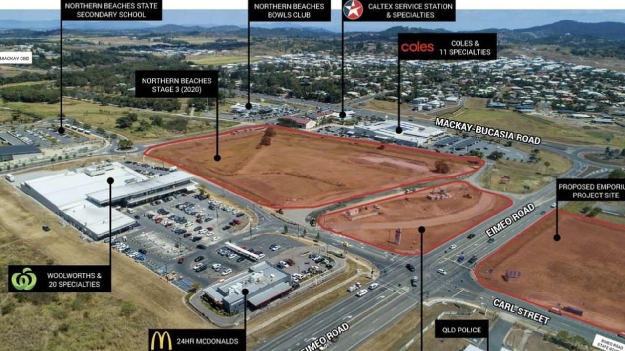 An Aerial View of A City with A Lot of Buildings and Roads — Mass Construction Group Australia Pty Ltd in South Mackay, QLD