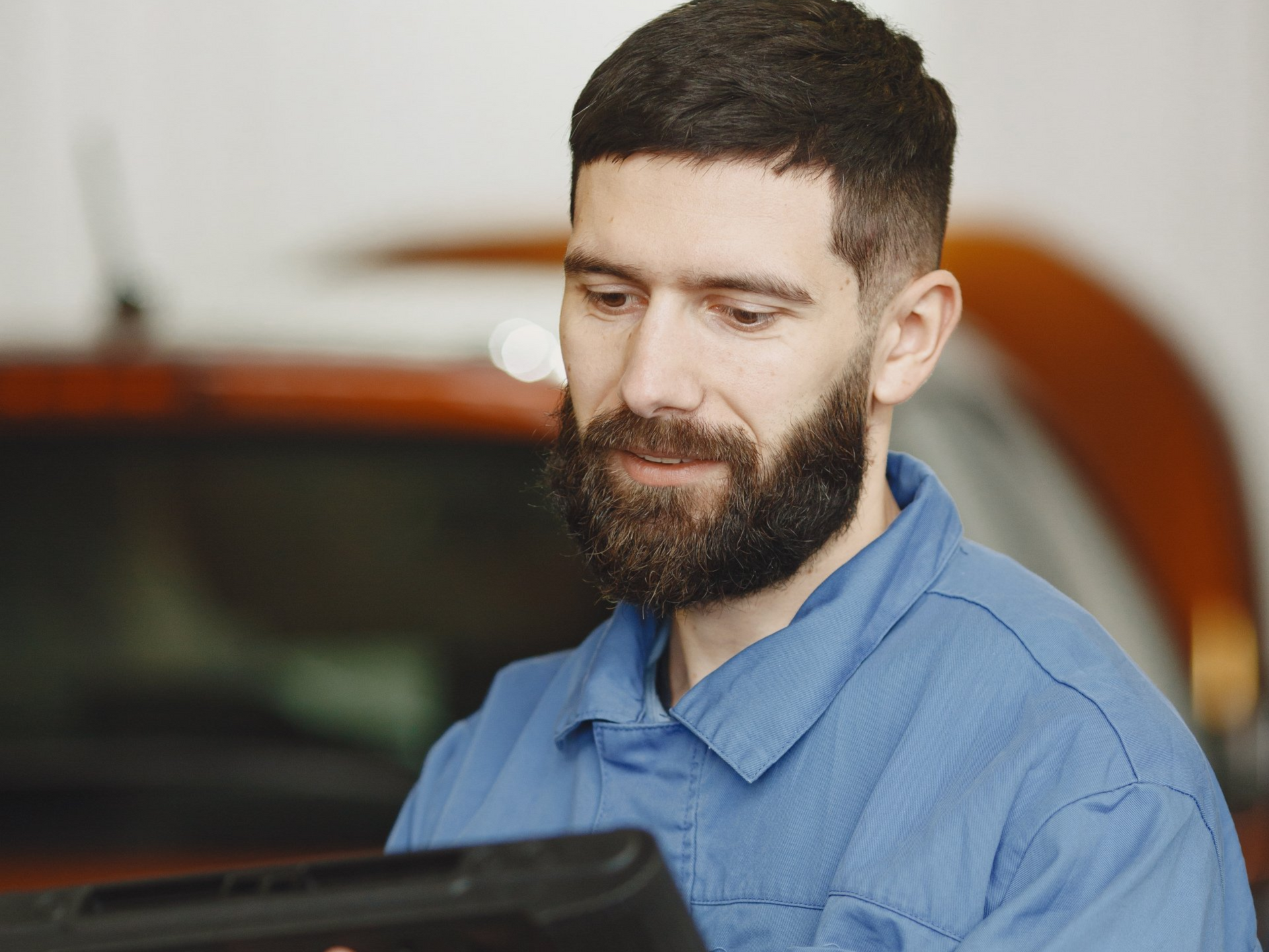 Mechanic using scanner for car diagnostic test at Dr. Jack’s Auto Repair in Merrick, NY
