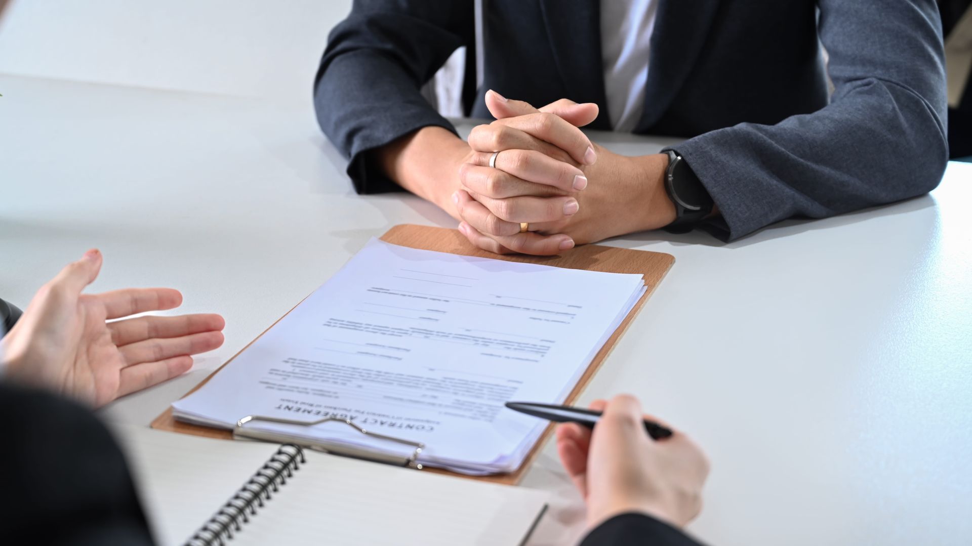 Lawyers Talking To Her Clients For Providing Law Consultation