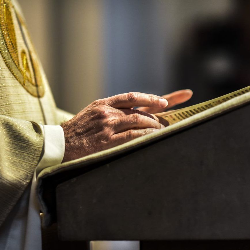 Pope reading from bible