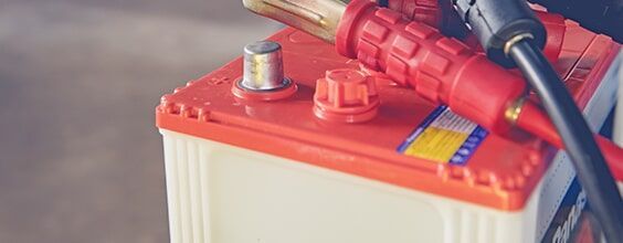 Car Batter With Tester — Bockman Batteries in Albury, NSW