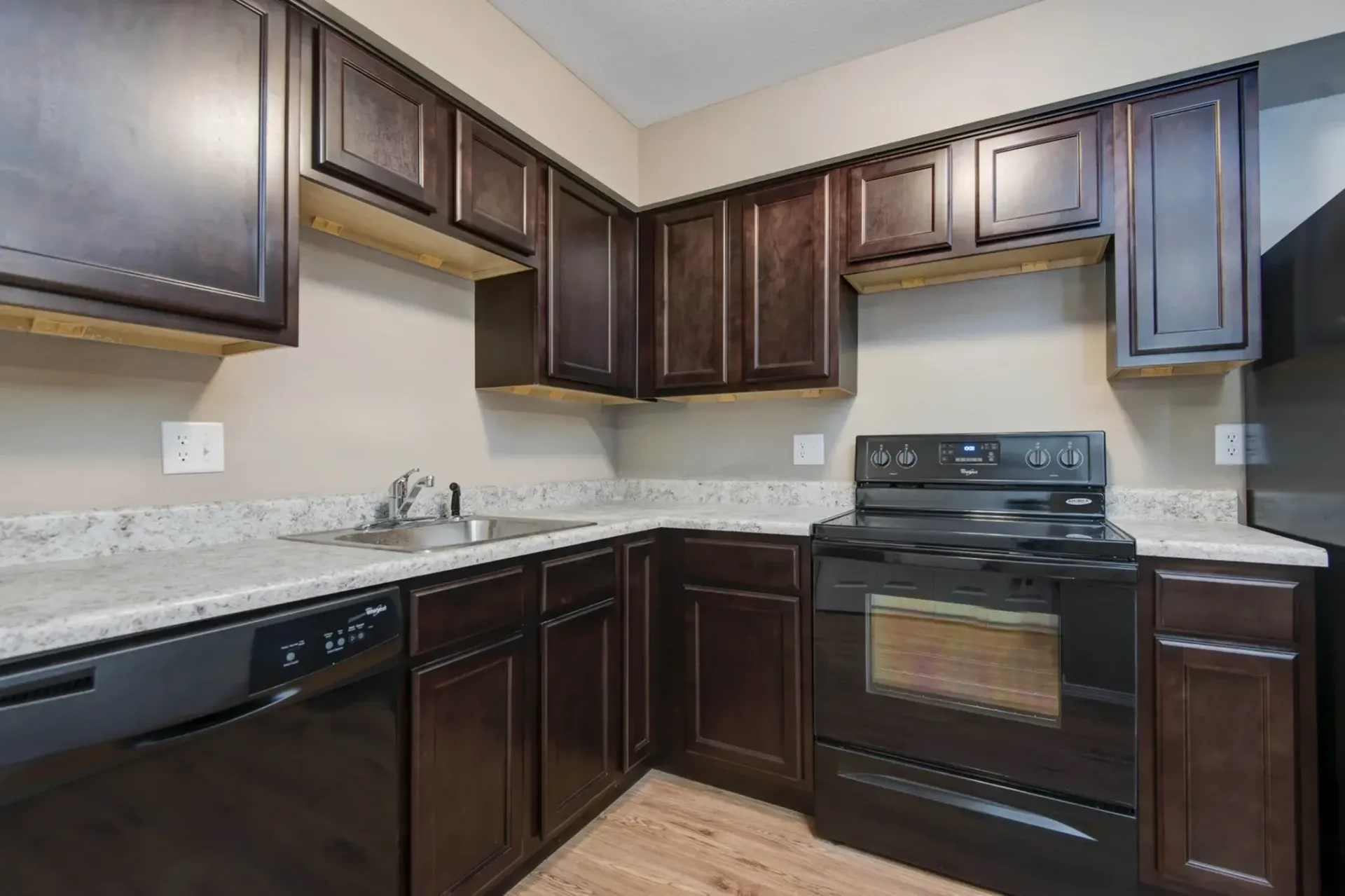 Photo of an L-shaped kitchen, showing the large amount of counter space