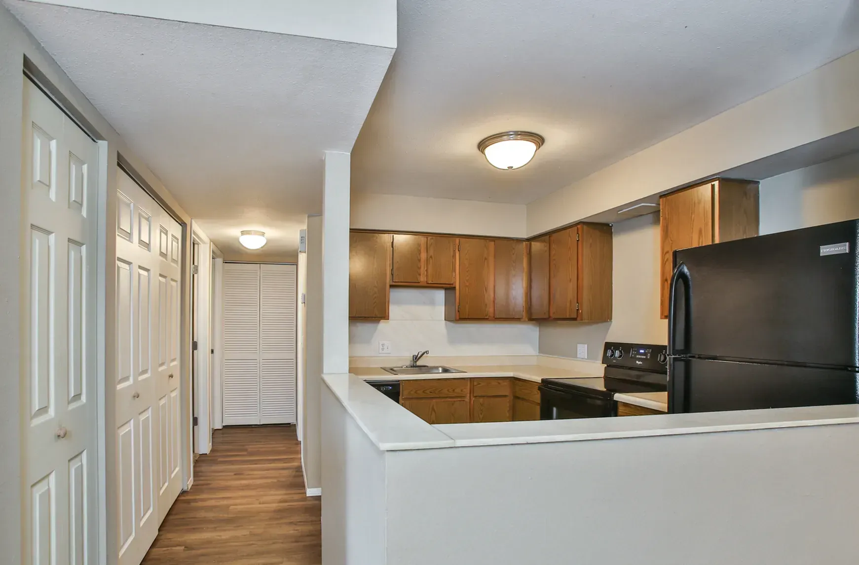 Photo of a hallway next to the kitchen