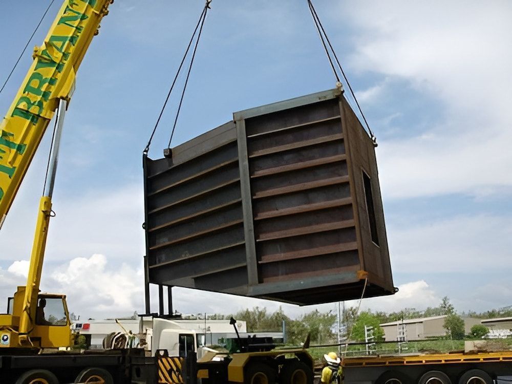 A Large Yellow Crane With The Word Bryan On It — Jakes Steel & Welding in East Arm, NT