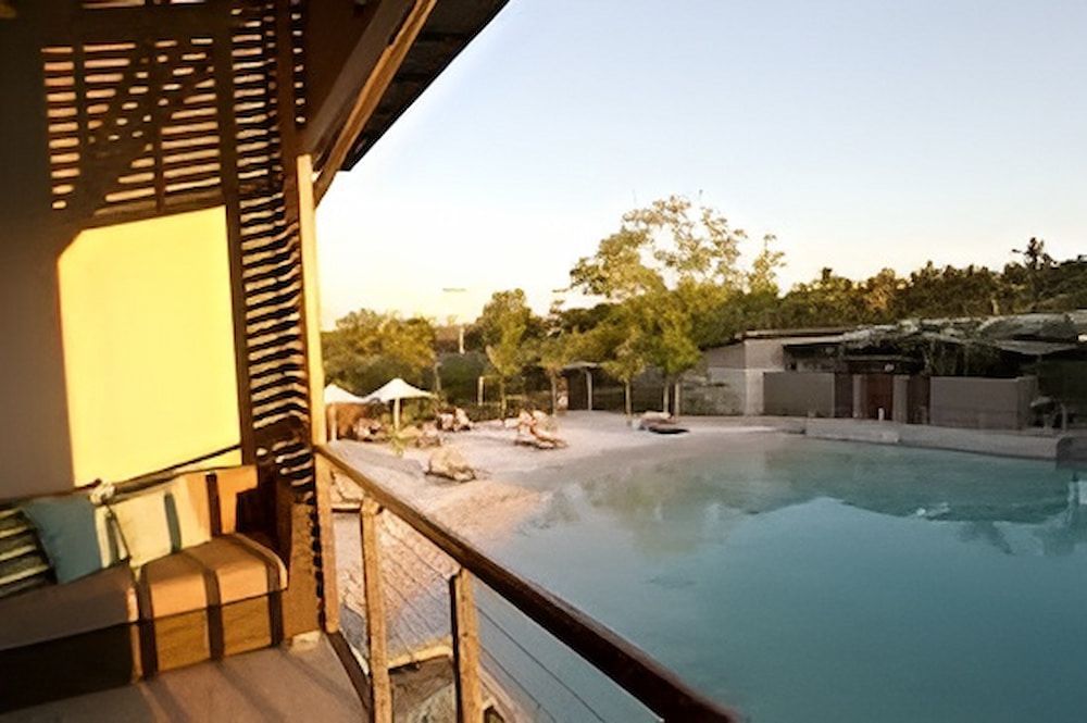 A View Of A Swimming Pool From A Balcony — Jakes Steel & Welding in East Arm, NT