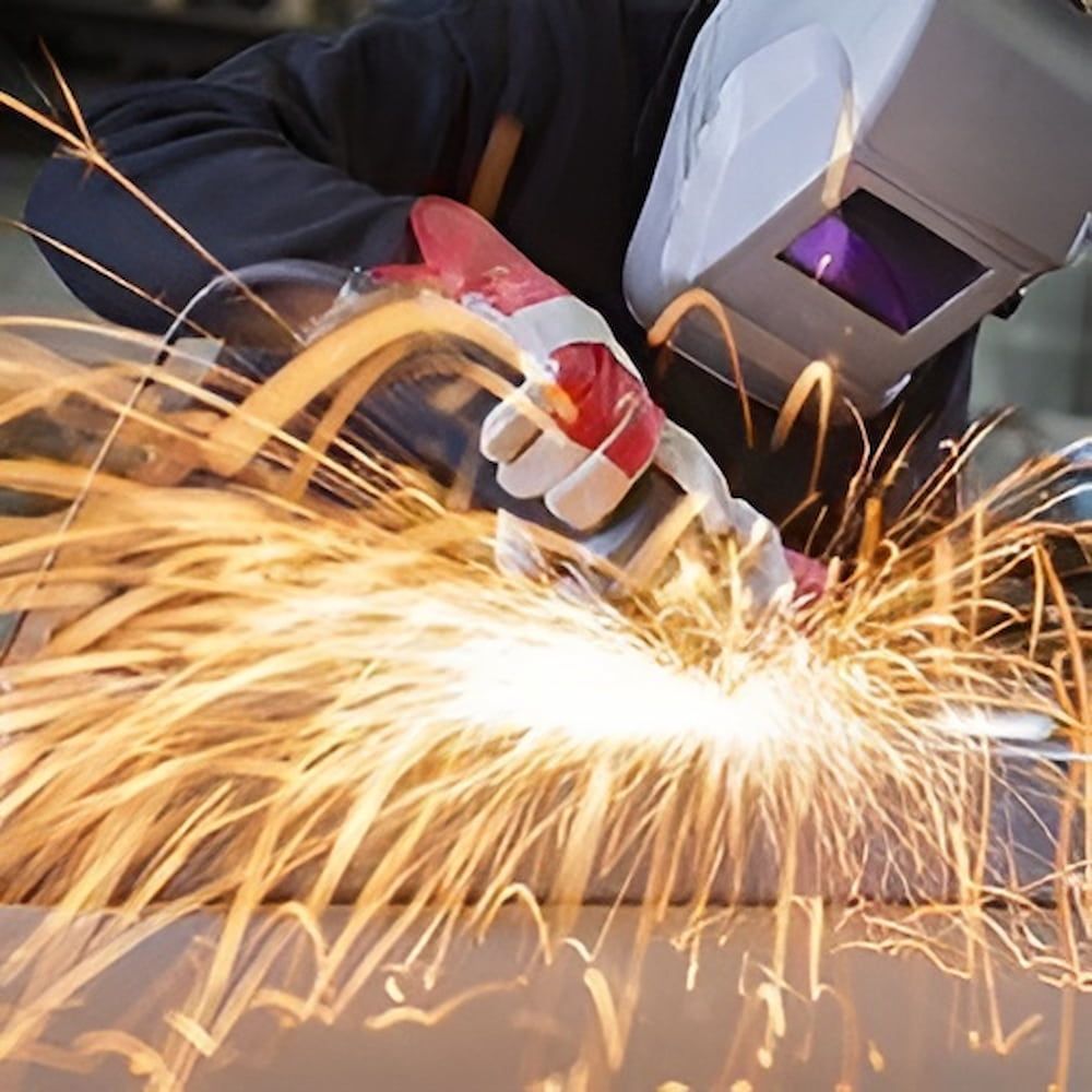 Welder Is Welding A Metal — Jakes Steel & Welding in East Arm, NT