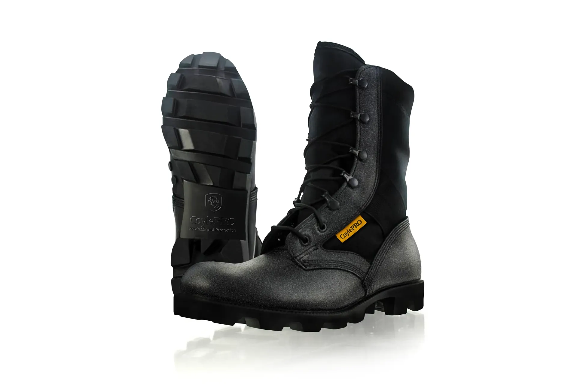 Black combat boots on a white background, one showing the sole.