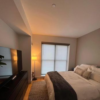 A Bedroom With a King Size Bed 