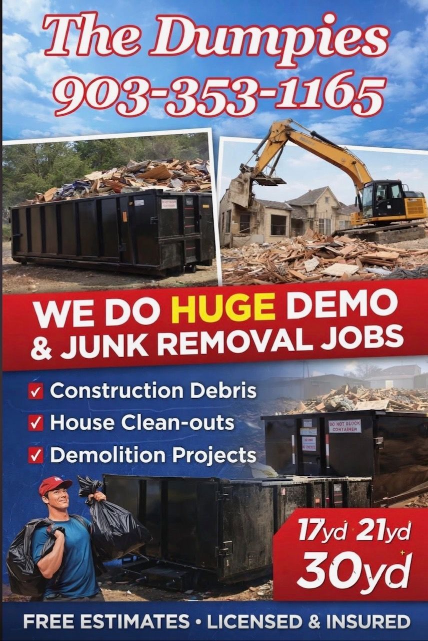 A truck is towing a trailer in a field.