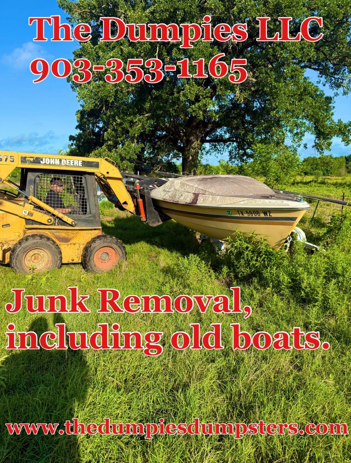 A truck is towing a trailer in a field.