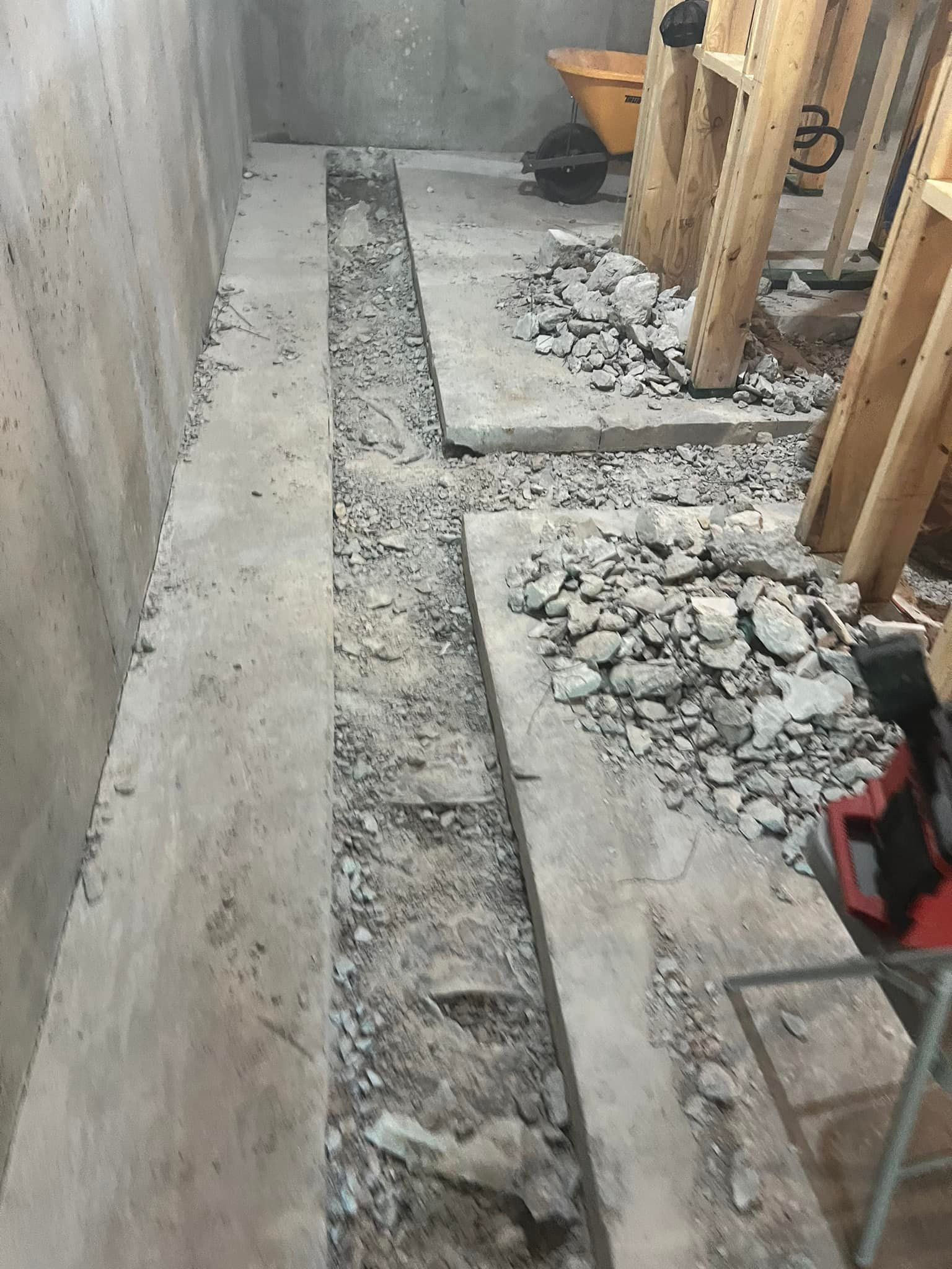 A construction site with a lot of rocks and concrete.