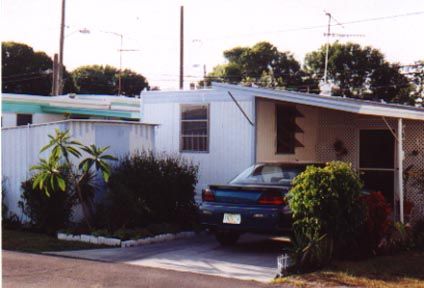 mobile home with car | Belleair Village Motel | Largo, FL