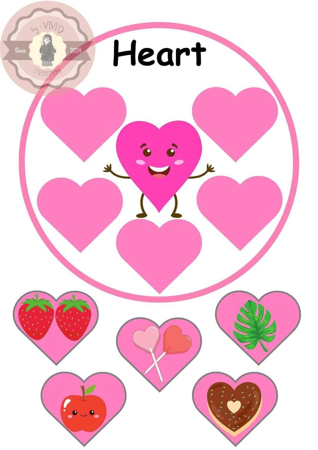 Pink heart-shaped matching game with cartoon heart character and hearts with strawberries, lollipops, leaf, apple, and donut.