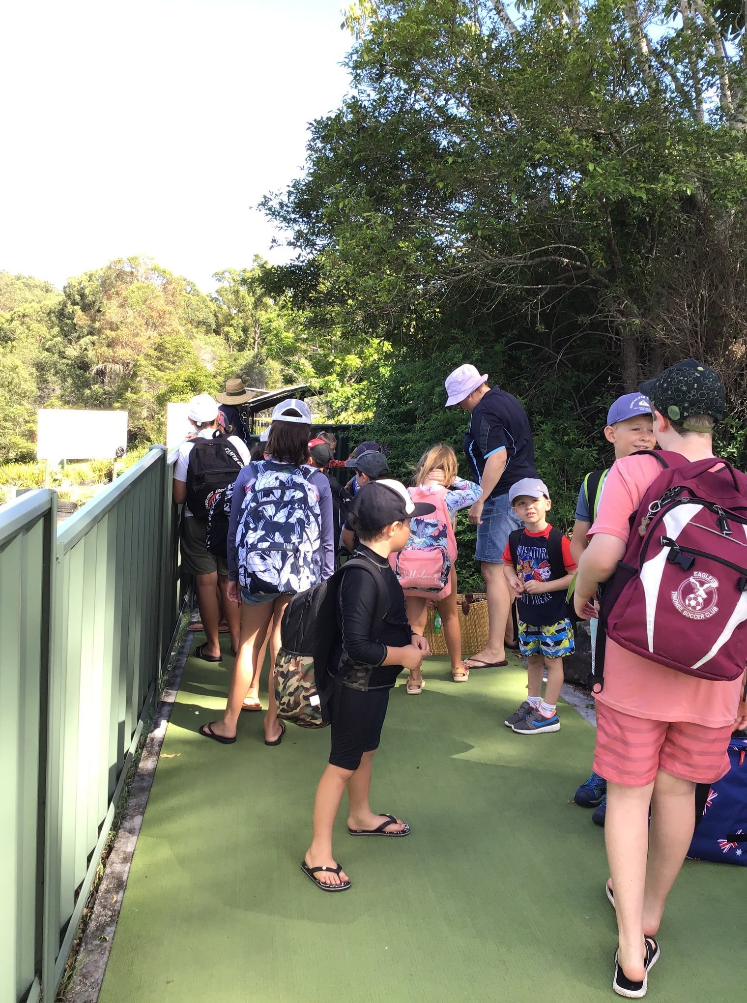 Group of children in swimsuits and backpacks — Earth Angels Child Care Centre in Tinonee, NSW