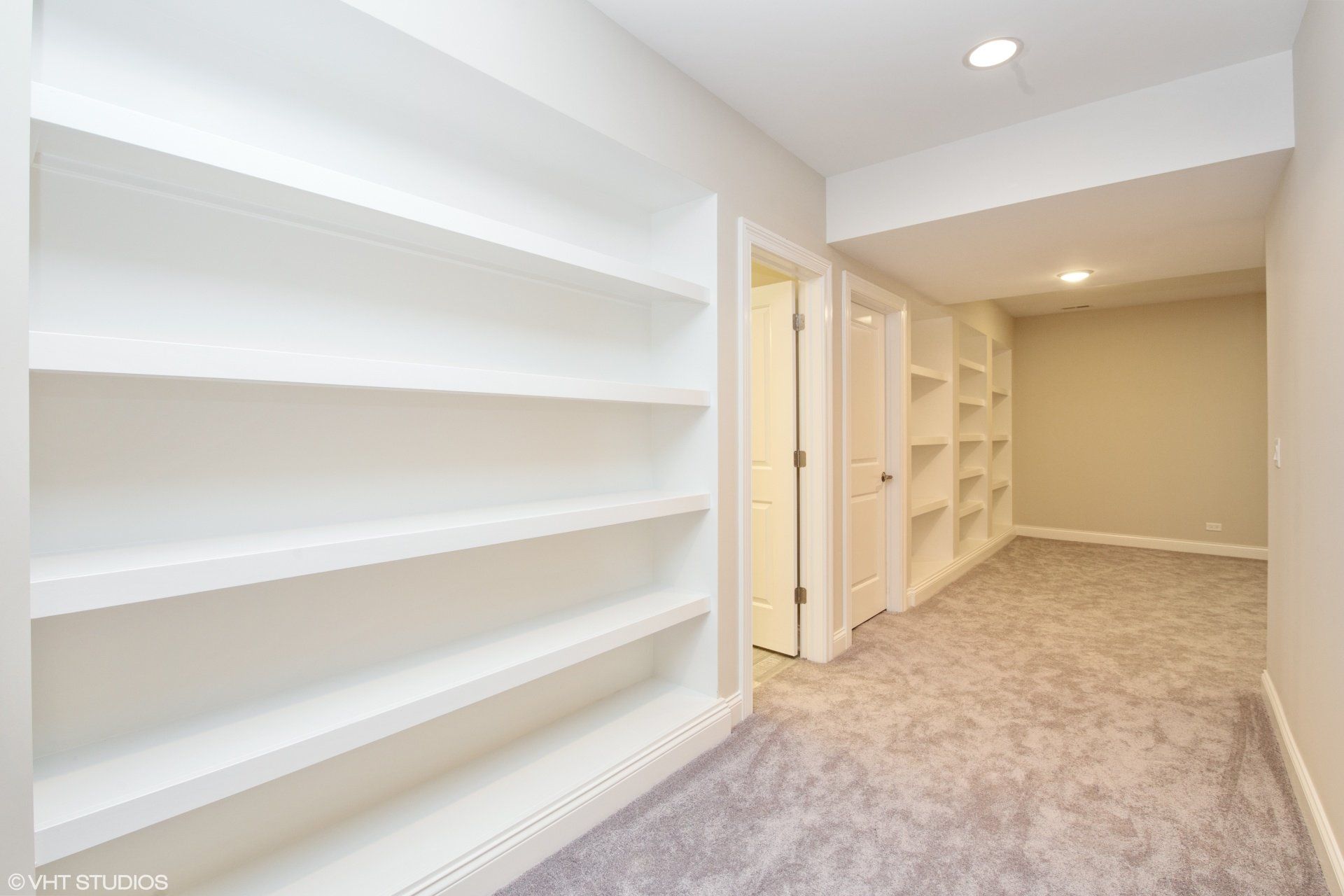 There are a lot of shelves in this room.