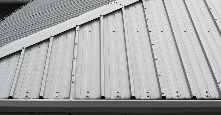 A metal roof that has a small slant to it