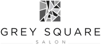 A black and white logo for grey square salon