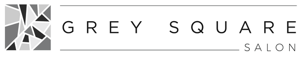 A black and white logo for grey square salon