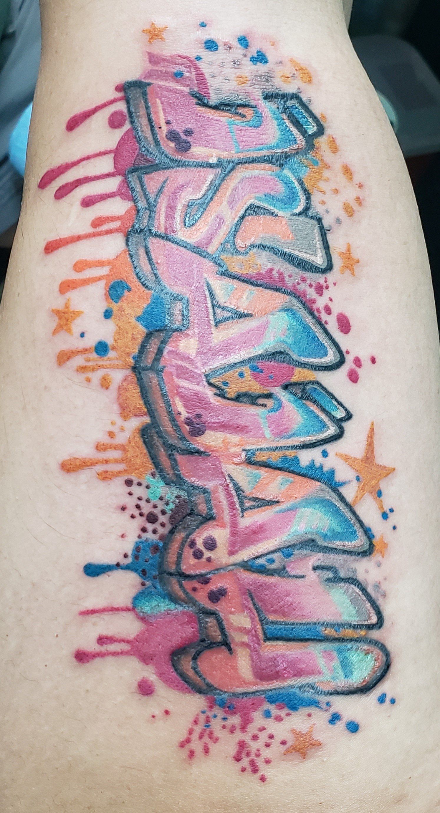 A Graffiti Tattoo — San Antonio, TX — Skin Graphics Tattoos & Body Piercing
