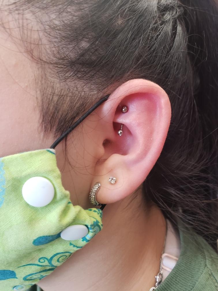 Ear  Piercing Female — Skin Graphics Tattoos & Body Piercing — San Antonio, Texas